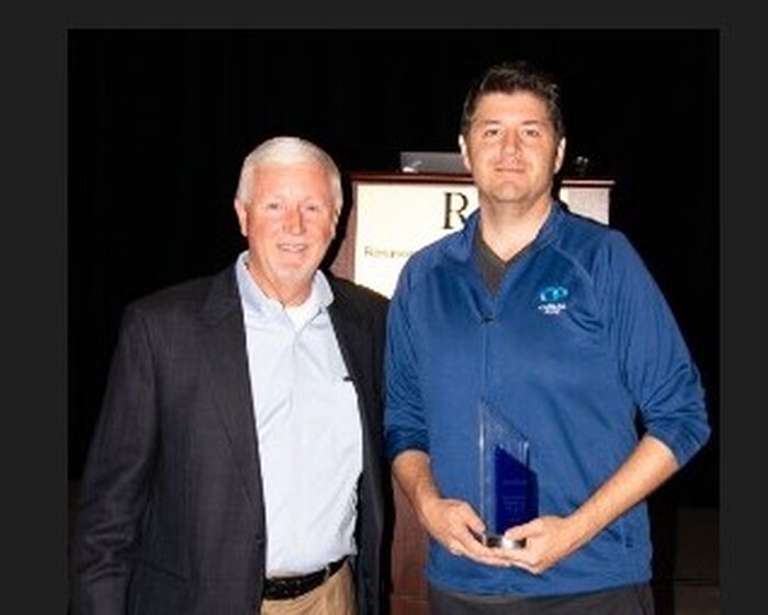 Pictured L-R: VP/Chief Information Officer Lynn Lovelady and Adam Lang