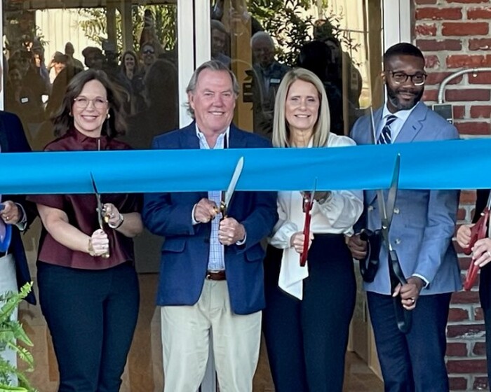 Chairman Phillip McWane celebrates Jimmie Hale Mission's dormitory renovation after donating kickstarter funds
