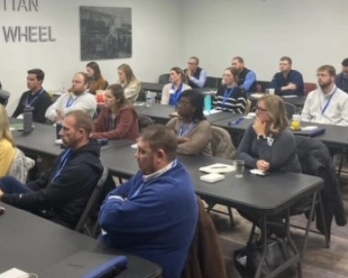 Manchester Tank - Quincy AGM Sam Parks participates in Quincy Leadership Institute panel