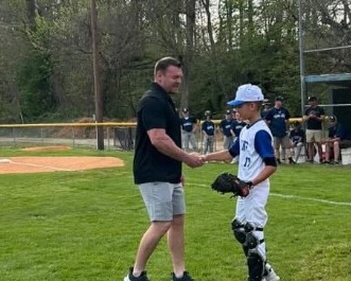 Building community through youth sports sponsorship